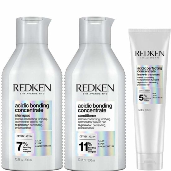 Redken Acidic Bonding Concentrate shampoo en conditioner 300 ml, en leave-in treatment 150 ml, in witte flessen met paarse en groene accenten.