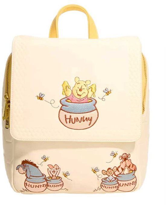 Off-white rugzak met gele hengsels. Voorop: Winnie de Poeh in pot honing, Eeyore en Kanga met Roe. Motief van honingraten op de zijkanten.