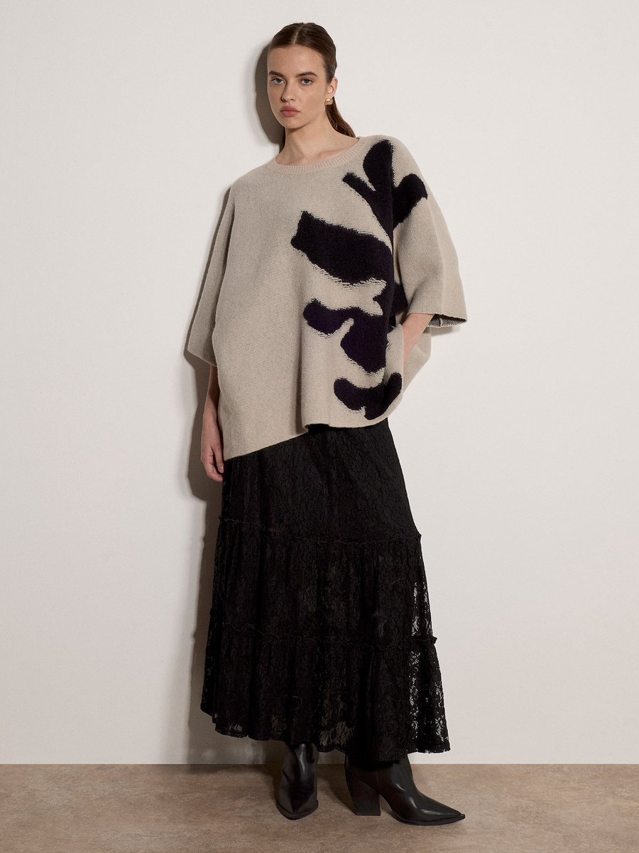 Oversized cape-trui met abstracte bloemenprint
