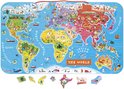 Puzzle carte du monde avec 92 magnets sur un tableau. Différentes formes de pays avec animaux et bateaux, avec magnets détachés en bas.