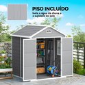 Grijze tuinschuur met open deuren, interieur met opbergplanken, gereedschap en een haspel. Met vloer. Tekst: 'PISO INCLUÍDO'.