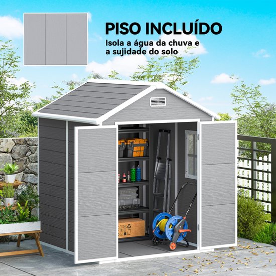 Grijze tuinschuur met open deuren, interieur met opbergplanken, gereedschap en een haspel. Met vloer. Tekst: 'PISO INCLUÍDO'.
