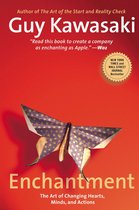 Boek 'Enchantment' van Guy Kawasaki, met een oranje kaft en een gouden origami vlinder.