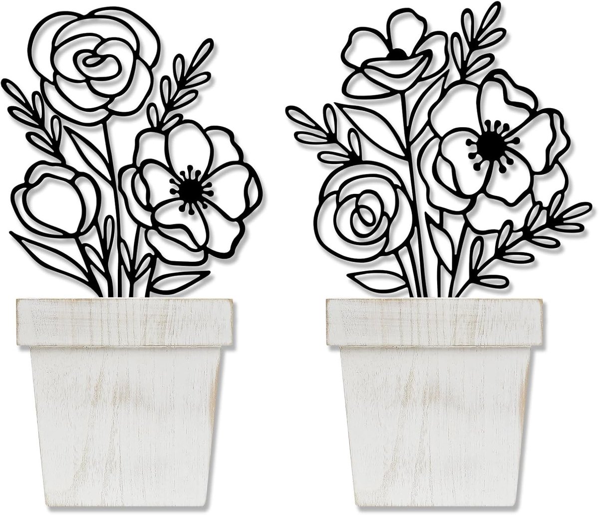 Muurdecoratie van metaal in zwart met bloemenmotief en bijpassende bloempot voor interieurstyling
