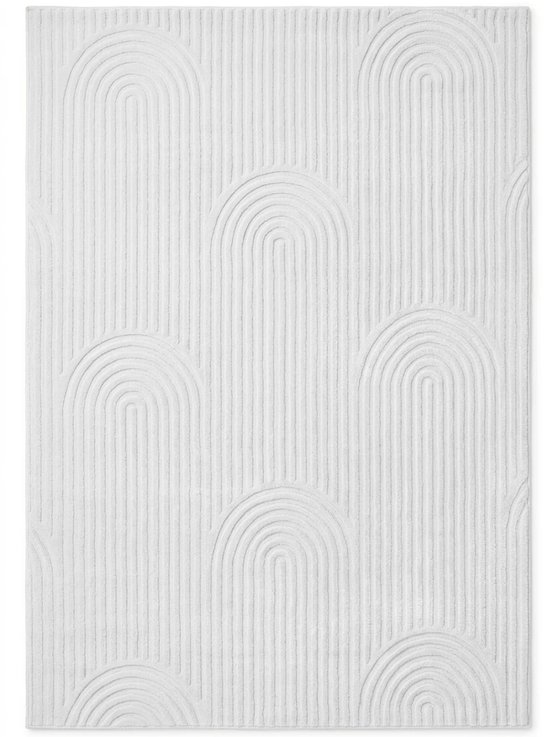 Crème laagpolig vloerkleed met een patroon van bogen en verticale lijnen.