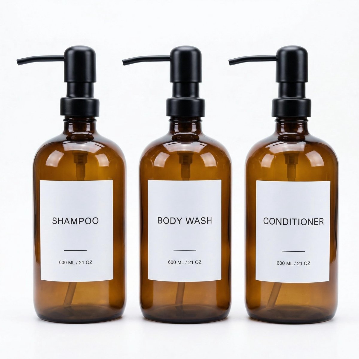 Dailygoods- Shampoo Dispenser Set van 3 - Duurzame PET Doucheflessen 600 ml - Roestvrijstalen Pomp - Trechter - Etiketten - Stijlvol Design