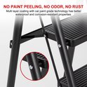 Close-up van de zwarte, gecoate metalen structuur van een ladder. Tekst: GEEN VERFKORRELING, GEEN GEUR, GEEN ROEST.