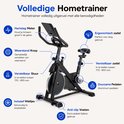 Zwarte hometrainer met diverse onderdelen aangeduid: hartslagmeter, weerstandsknop, verstelbaar stuur, zadel en pedalen.
