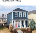 Buitenafbeelding van een blauw huis met drie ingestelde favoriete punten aangegeven op de tuin, met de tekst 'Favorite point setting'.