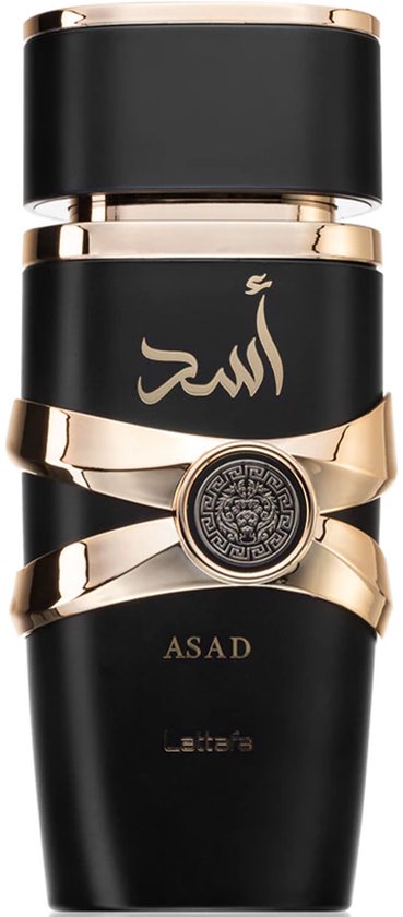 Flacon de parfum noir avec des accents dorés et "ASAD" en calligraphie arabe.