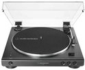 Grijze platenspeler met gesloten kap, zwarte mat met Audio-Technica logo en toonarm.