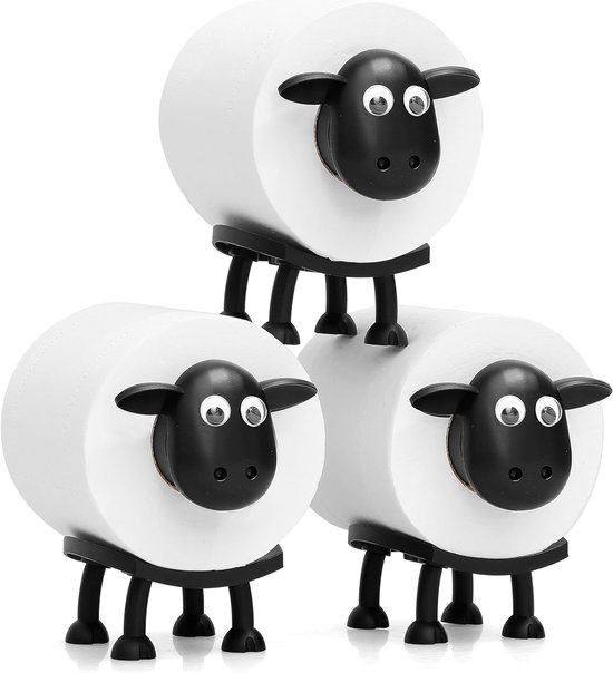 Drie toiletrolhouders in de vorm van een zwart-wit schaap, gestapeld en geïsoleerd op een witte achtergrond.