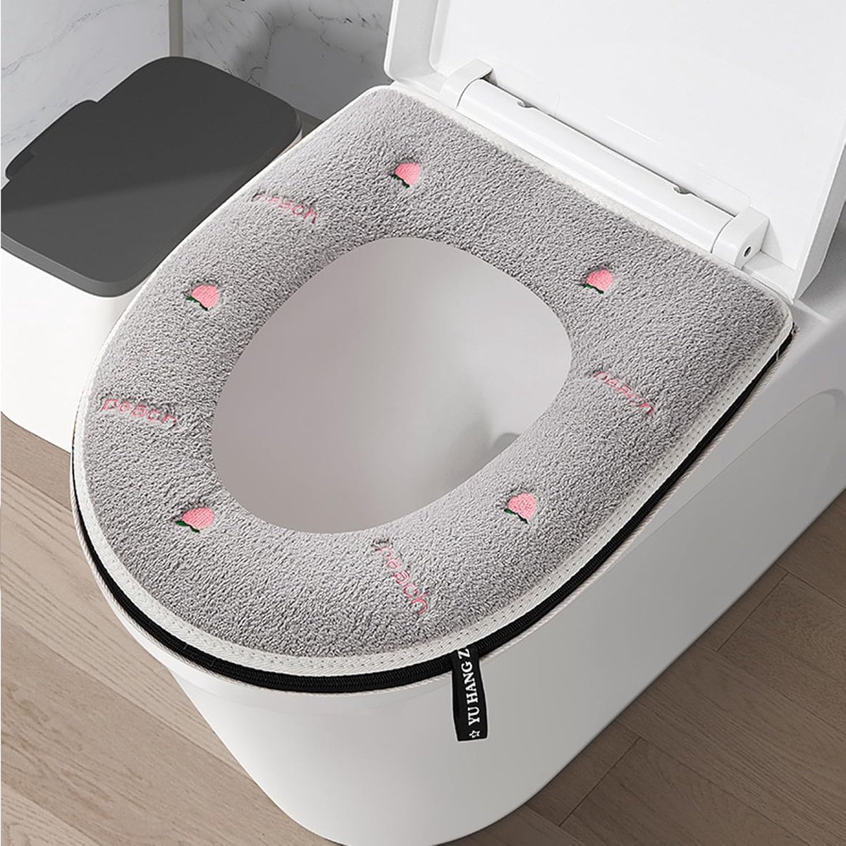 Warme toiletstoelhoes met antislip en ritssluiting - pluche kussen met schattige perzikpatronen - wasbaar en comfortabel 38 x 43 cm