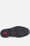 Zool van bruine leren schoen met het rode Rieker logo en een antislip profiel.