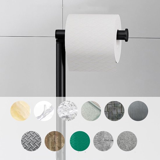 Zwarte toiletrolhouder met toiletborstel en diverse materiaaltexturen.