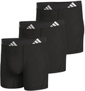 Drie zwarte Adidas boxer briefs met wit Adidas logo op de elastische band, gestapeld.
