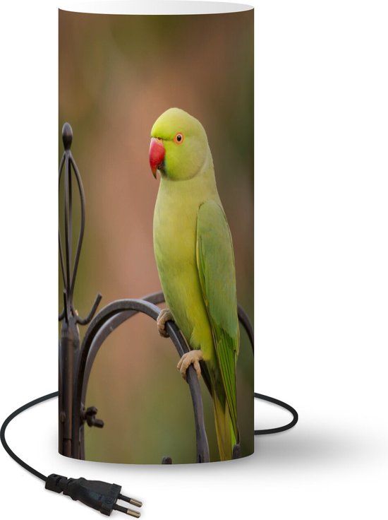 Lampe perruche à collier - Une perruche à collier verte sur une cage sur  fond délavé -... | bol.com