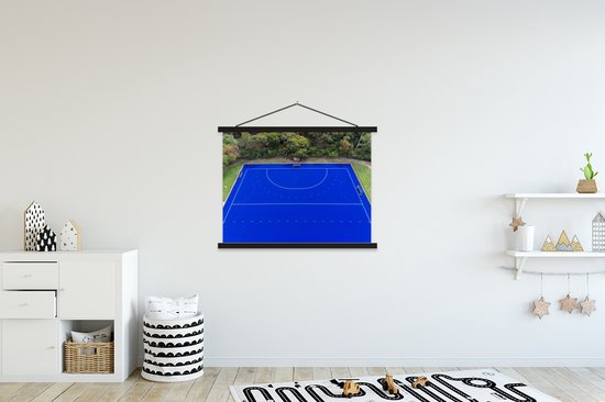 Photo aérienne d'une affiche textielposter sur le terrain de hockey bleu 150x113 cm