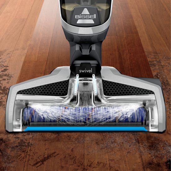 Bissell Crosswave C3 Select steelstofzuiger met roterende borstels op een glanzende houten vloer.