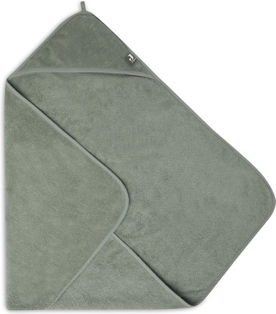 Close-up detail van de hoek van een groene Jollein badcape met Jollein label.