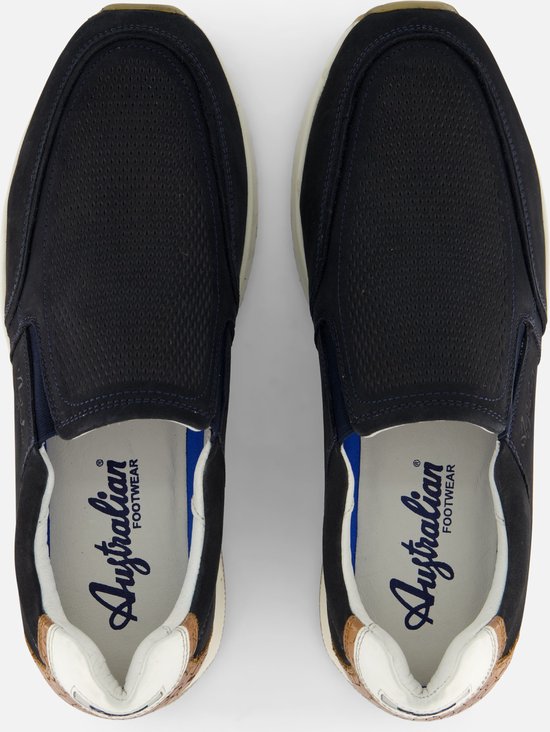 Vue de dessus de mocassins bleus 'Australian Footwear' avec une semelle blanche et des accents marron.