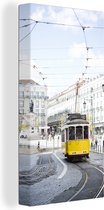 Canvas schilderij 80x160 cm - Wanddecoratie Een gele tram met een kabelbaan rijdt door Lissabon - Muurdecoratie woonkamer - Slaapkamer decoratie - Kamer accessoires - Schilderijen