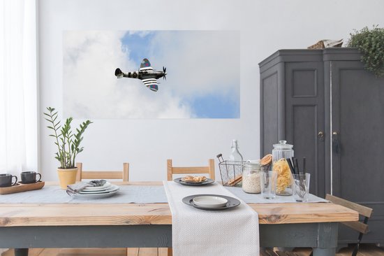 Affiche avion Spitfire dans un ciel nuageux - 160x80 cm