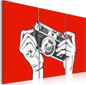 Schilderij - A photographer.