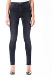 Zwarte vintage skinny jeans met hoge taille gedragen door een model.