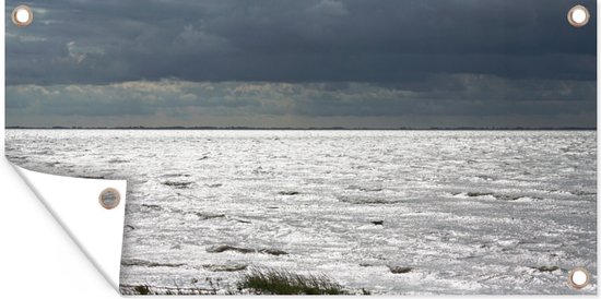 Schuttingposter De waddenkust bij Ameland op een stormachtige dag - 200x100 cm - Tuindoek