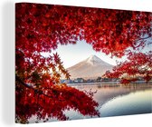 Tableau sur toile La montagne Fuji vue à travers les feuilles rouges au Japon - 60x40 cm - Décoration murale