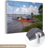 MuchoWow® Glasschilderij 90x60 cm - Schilderij acrylglas - Kleurrijke boten in een rivier in Paramaribo - Foto op glas - Schilderijen