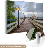 MuchoWow® Glasschilderij 90x60 cm - Schilderij acrylglas - Pier in Paramaribo op een regenachtige dag - Foto op glas - Schilderijen