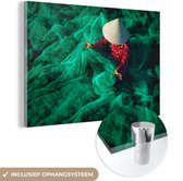 MuchoWow® Glasschilderij 60x40 cm - Schilderij acrylglas - Vrouw tussen visnetten in Vietnam - Foto op glas - Schilderijen