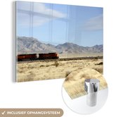 MuchoWow® Glasschilderij 60x40 cm - Schilderij acrylglas - Een rode trein in de woestijn - Foto op glas - Schilderijen