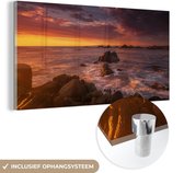 MuchoWow® Glasschilderij 160x80 cm - Schilderij acrylglas - Een zonsondergang boven Big Sur in Amerika - Foto op glas - Schilderijen