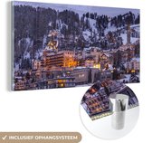 MuchoWow® Glasschilderij 80x40 cm - Schilderij acrylglas - Bergdorp in Zwitserland tijdens de winter - Foto op glas - Schilderijen