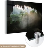 MuchoWow® Glasschilderij 60x40 cm - Schilderij acrylglas - Natuurlijke grot in het regenwoud van Maleisië - Foto op glas - Schilderijen