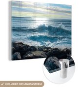 MuchoWow® Glasschilderij 80x60 cm - Schilderij acrylglas - Zee - Stenen - Zon - Foto op glas - Schilderijen
