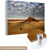 MuchoWow® Glasschilderij 180x120 cm - Schilderij acrylglas - Wolkendek boven de rode kleuren in de woestijn van het Namib-Naukluft park - Foto op glas - Schilderijen
