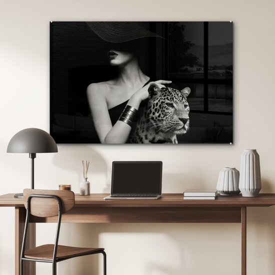 MuchoWow® Glasschilderij 120x80 cm - Schilderij acrylglas - Vrouw - Luipaard - Luxe - Zwart - Wit - Dier - Foto op glas - Muurdecoratie woonkamer - Wanddecoratie slaapkamer - Schilderijen