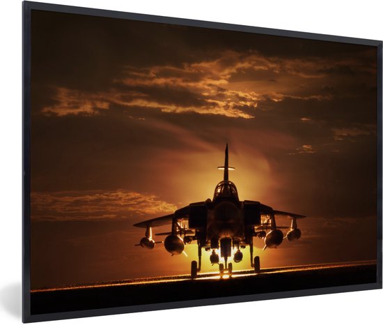 Fotolijst incl. Poster - Een silhouet van een straaljager tijdens een zonsondergang - 60x40 cm - Posterlijst