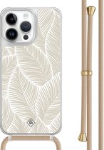 Casimoda® hoesje met beige koord - Geschikt voor iPhone 13 Pro Max - Palm Leaves Beige - Afneembaar koord - TPU/polycarbonaat - Bruin/beige