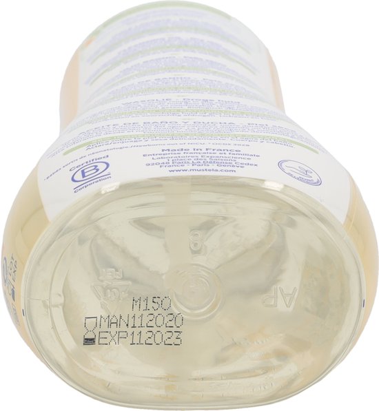 Onderkant van een Mustela doucheolie fles met productiedatum 'MAN112020' en houdbaarheidsdatum 'EXP112023'.