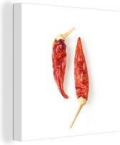 Canvas Schilderij Droge rode chilipepers met witte achtergrond - 50x50 cm - Wanddecoratie