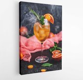 Canvas schilderij - Cocktail with orange juice and ice cubes. Glass of orange soda drink on dark background -  1092113264 - 40-30 Vertical