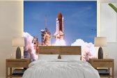 Behang - Fotobehang Het opstijgen van een spaceshuttle - Breedte 240 cm x hoogte 240 cm