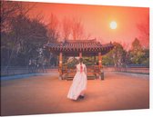 Vrouw in traditionele jurk bij een zonsondergang in Seoul - Foto op Canvas - 90 x 60 cm