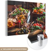 MuchoWow® Glasschilderij 90x60 cm - Schilderij acrylglas - Spaanse Keuken - Tapas - Schalen - Foto op glas - Schilderijen