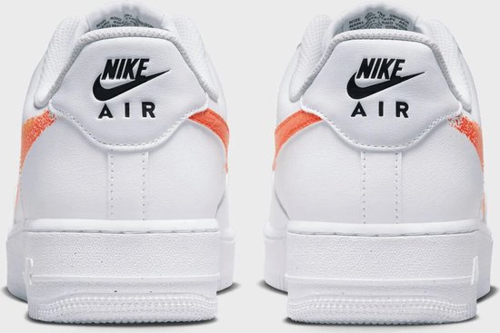 orange and white air force 1 low